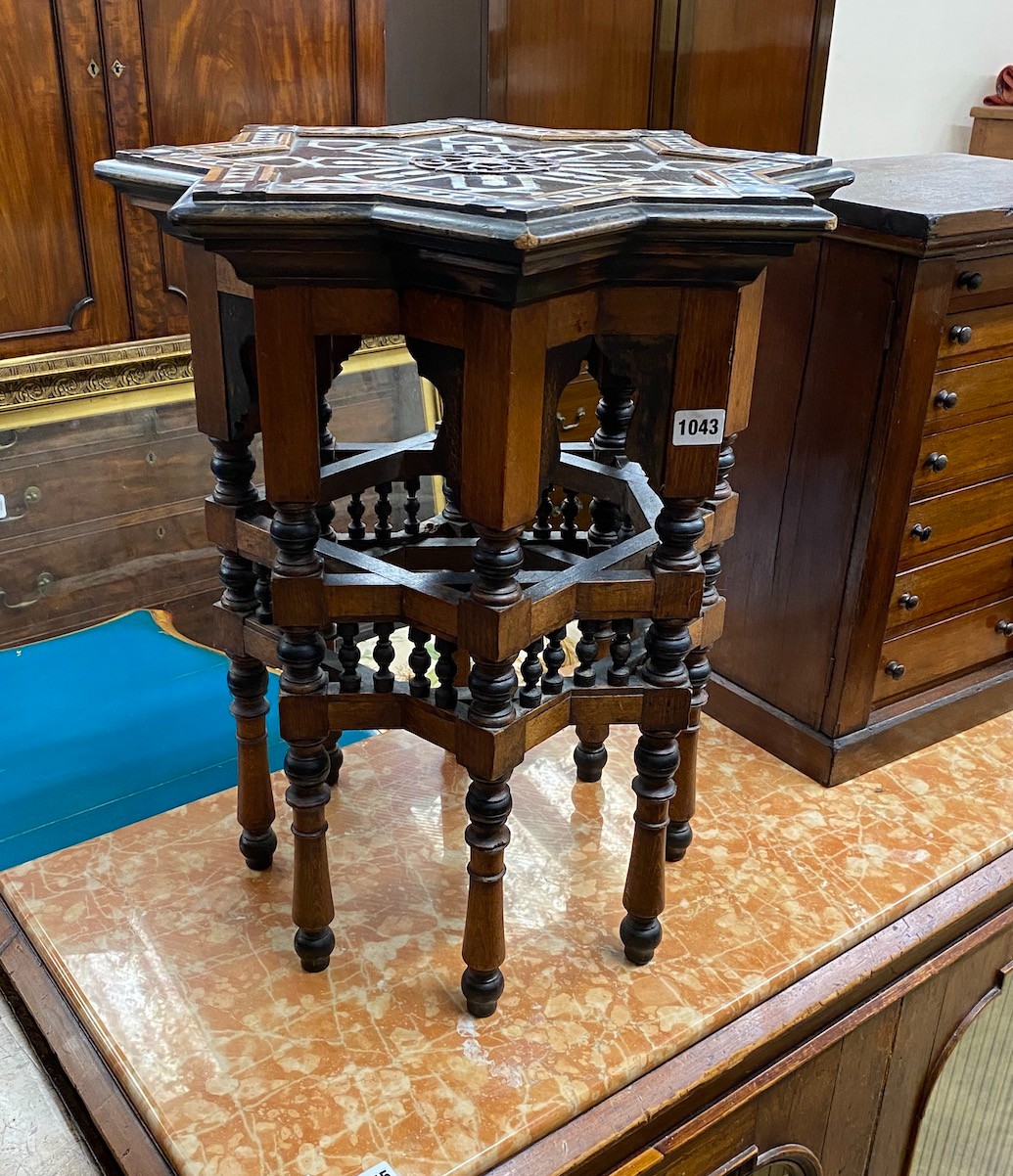 A Moorish mother of pearl inlaid occasional table, width 50cm, height 58cm